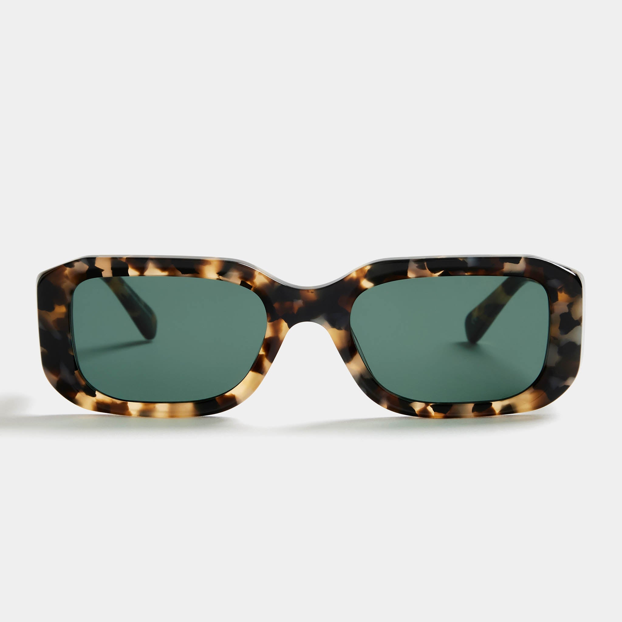 Rectangular tortoiseshell sunglasses with green lenses on white background